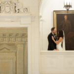 Couple stands on balcony at American Swedish Historical Museum