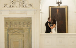 Couple stands on balcony at American Swedish Historical Museum